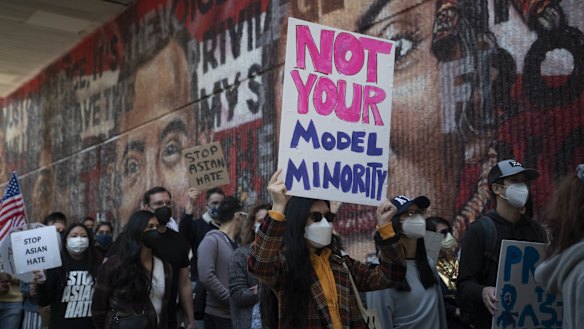 Demonstrators march to CNN Centre following a Stop Asian American Pacific Islander Hate Rally in Atlanta, Georgia.