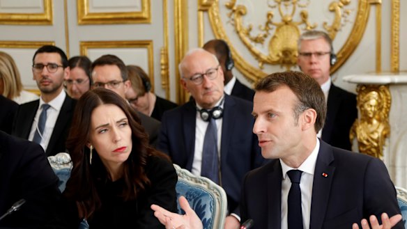 French President Emmanuel Macron and New Zealand's Prime Minister Jacinda Ardern attend a meeting at the Elysee Palace.
