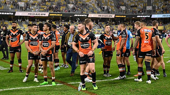 The Wests Tigers after their controversial last-second loss to the Cowboys.
