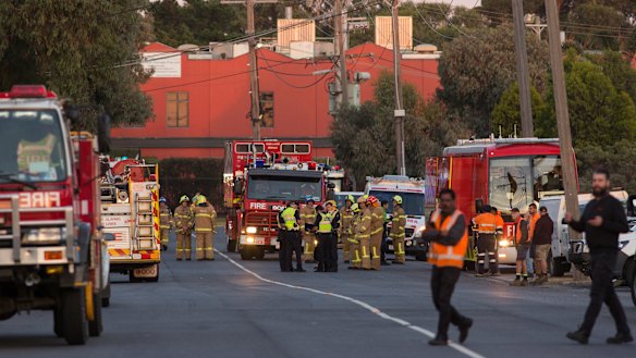 Firefighters at the factory in Thornycroft Road, Campbellfield.