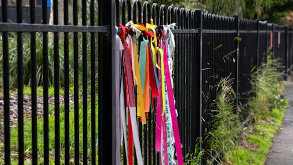 Ribbons attached to the fence at Beaumaris Primary School in support of childhood victim survivors of historical sexual abuse.