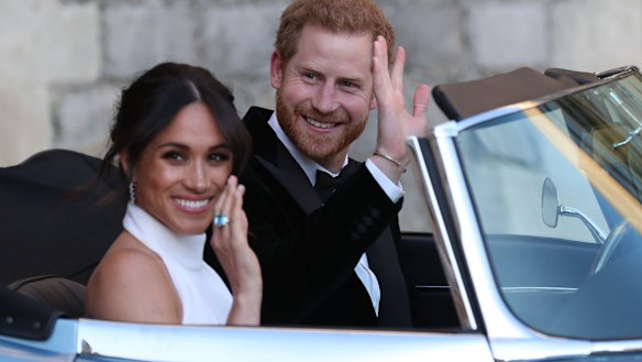The newly married Duke and Duchess of Sussex in the E-Type Jag.