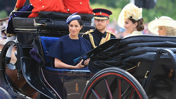 Meghan Duchess of Sussex (left, with Prince Harry and Catherine Duchess of Cambridge and Camilla Duchess of Cornwall) is tipped to be guest-editing British 'Vogue'.