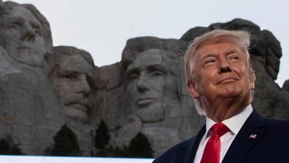 President Donald Trump smiles at Mount Rushmore National Memorial in South Dakota on July 3.
