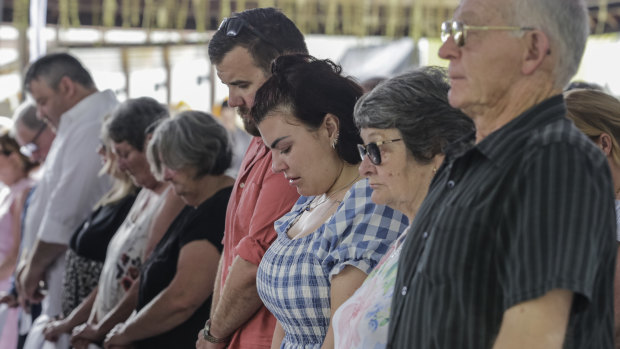 Relatives of victims and survivors attend a memorial service at the Australian consulate-general in Denpasar.
