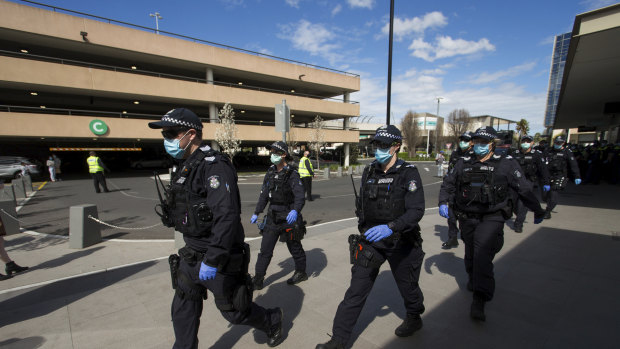 Police arriving at Chadstone Shopping Centre on Sunday.