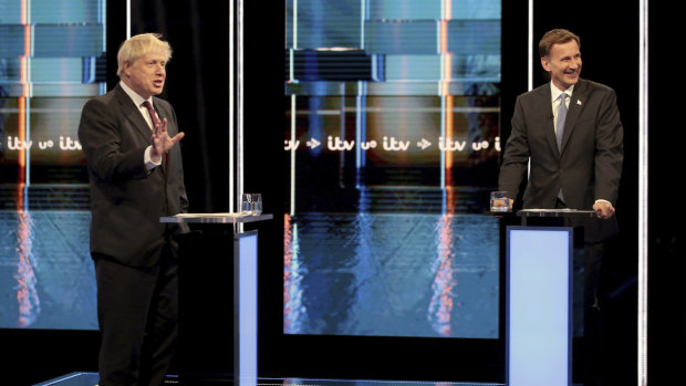 Britain's Conservative Party leadership candidates Boris Johnson, left, and Jeremy Hunt, during a live head-to-head TV debate.