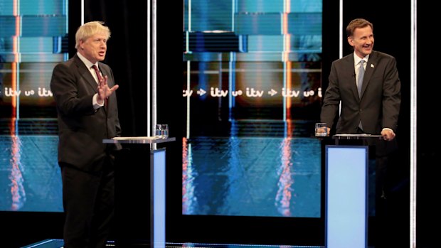 Britain's Conservative Party leadership candidates Boris Johnson, left, and Jeremy Hunt, during a live head-to-head TV debate.