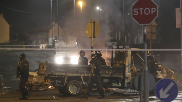 Police guard a crime scene during unrest in the Creggan area of Londonderry, in Northern Ireland, in April.