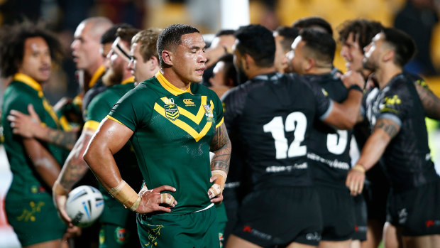 Eyes wide shut: Tyson Frizell can't look  as the Kiwis celebrate another try.