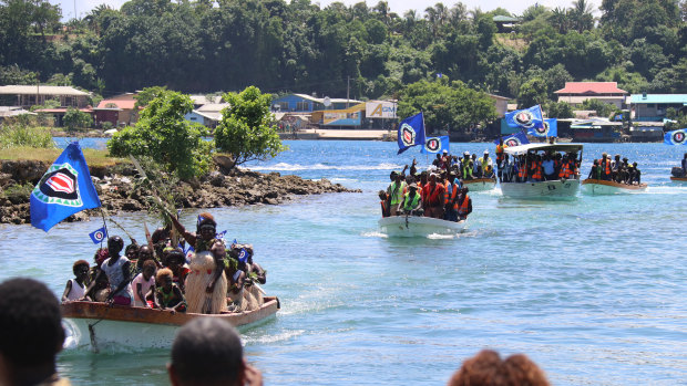 Ballot boxes are returned by boat to Buka, Bougainville, Papua New Guinea.
