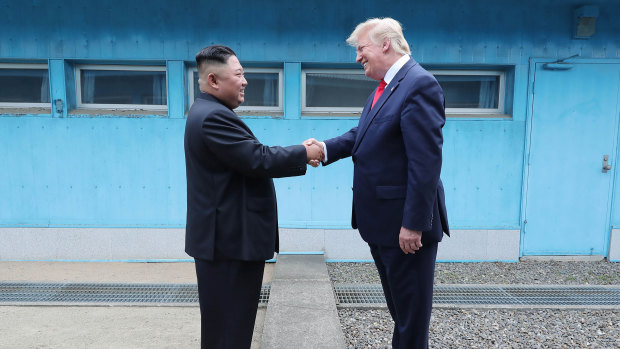 Kim Jong-un and Donald Trump meet in the demilitarised zone. 