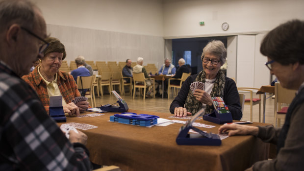 Playing cards at the senior centre.