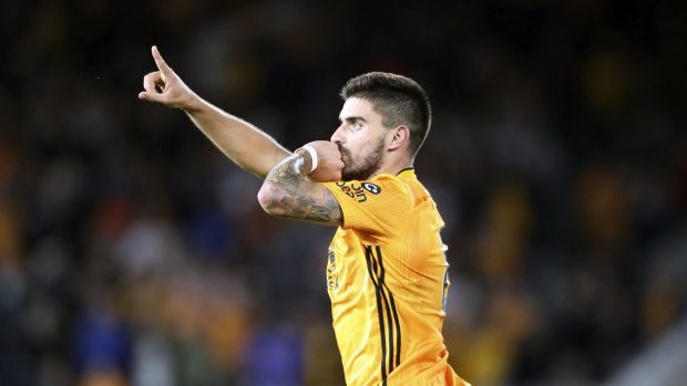 Wolves' Ruben Neves celebrates his superb strike in their second-half comeback.