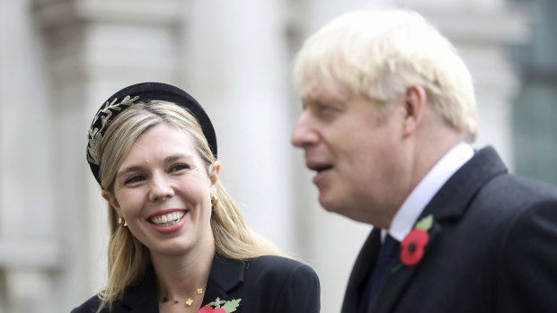Britain's Prime Minister Boris Johnson, right, with partner Carrie Symonds.