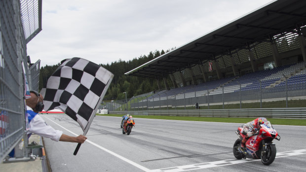 Jack Miller crosses the finish line at the Styrian Grand Prix in Austria.