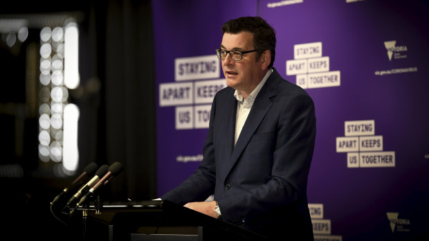 Premier Daniel Andrews addresses the media on Sunday.