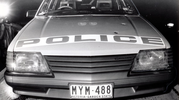 A police car showing bullet holes from the shooting in Noble Park.