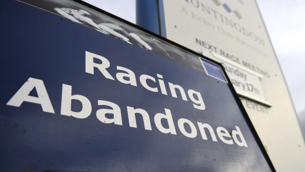 A sign at Huntingdon Racecourse, in England, with racing postponed because of equine flu.