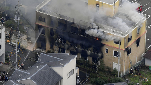 Smoke billows from a three-storey building of Kyoto Animation in Japan on Thursday.