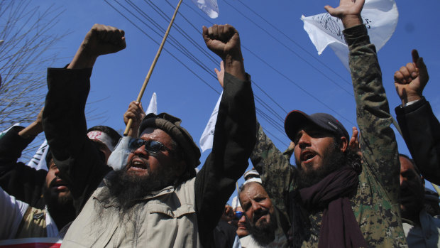 Protesters rally to express solidarity with Indian Kashmiris struggling for their independence in Peshawar, Pakistan.