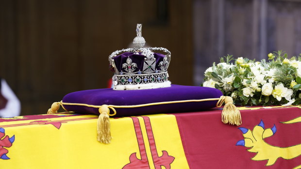 The Imperial State Crown rests on the Queen’s coffin.