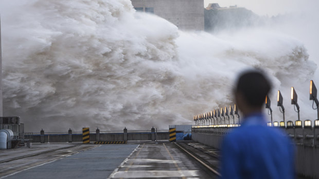 Floodwaters are discharged at the Three Gorges Dam in central China’s Hubei province on Sunday.