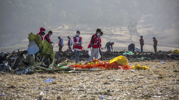 Rescuers work at the scene of the Ethiopian Airlines flight, outside Addis Ababa. 