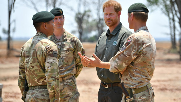 Prince Harry at the memorial site dedicated to guardsman Mathew Talbot in Liwonde National Park. Mr Talbot lost his life on an anti-poaching patrol in May.
