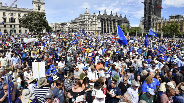 Crowds arrive in Parliament Square in central London, during the People's Vote march for a second EU referendum, in central London,  on Saturday.