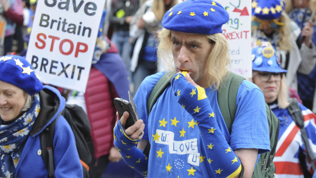 Demonstrators protest against Brexit as the governing Conservative Party start their annual four-day party conference on Sunday.