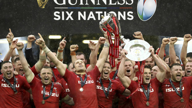 Jubilation: Wales players celebrate success against Ireland in Cardiff.