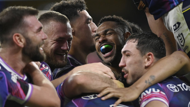 The Cowboys celebrate the win that kept them in outright second on the NRL ladder.