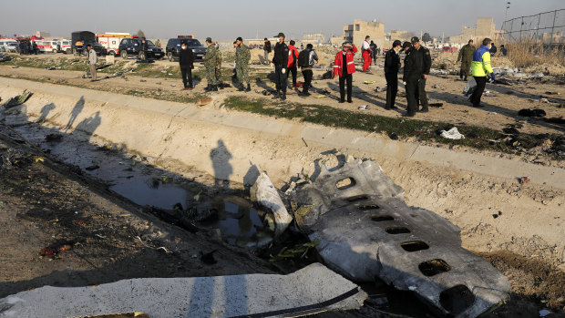 The wreckage of the airliner was strewn across farmland near the airport. 