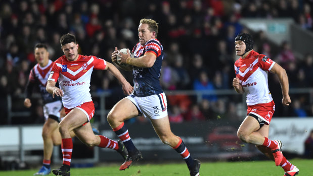 Mitchell Aubusson takes the ball up for the Roosters.