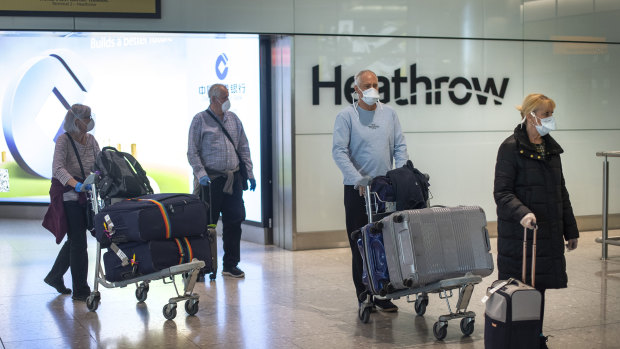 Arrivals at London's Heathrow. Soon visitors will be asked to download an app like CovidSafe. 