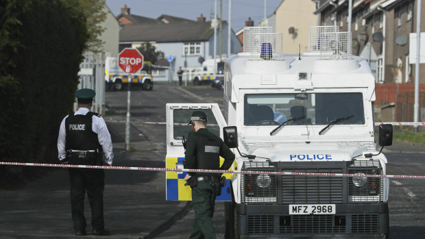 Police at the scene in Londonderry, Northern Ireland in 2019, following the death of 29-year-old journalist Lyra McKee who was shot and killed in a flare up of partisan violence.