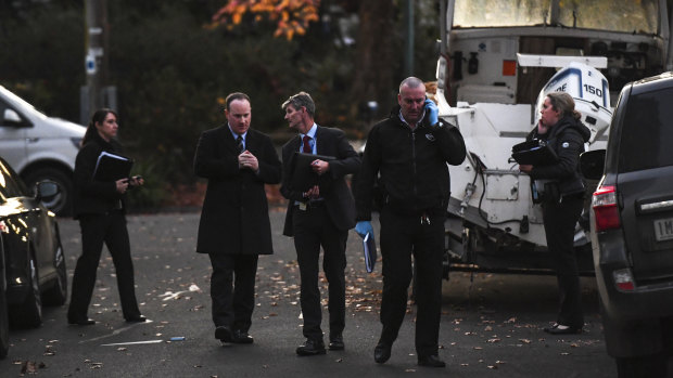 Police on a street in Notting Hill, where a man and woman were found dead in a house earlier on Thursday. 