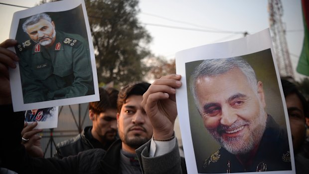 Pakistanis demonstrate over the US air strike in Iraq that killed Iranian Qassem Soleimani, in Peshawar, Pakistan.