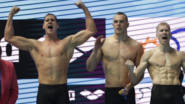 L-R: Alex Graham, Kyle Chalmers and Clyde Lewis celebrating winning the men's 4x200m freestyle relay.