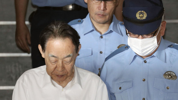Hideaki Kumazawa, a former top Japanese government official, has been arrested in his son's killing and media reports say the retired bureaucrat told investigators he had feared his reclusive son might harm others. 