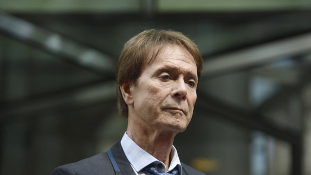 Singer Cliff Richard leaves the Rolls Building where he was awarded more than 200,000 sterling pounds in damages after winning his High Court privacy battle against the BBC.
