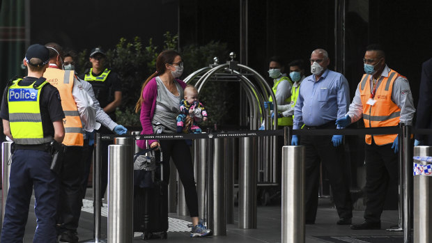 Australians returning from overseas are being bussed from the airport to the Crown Promenade hotel in Southbank where they will spend 14 days of forced isolation in a bid to flatten the curve of COVID-19 cases. 