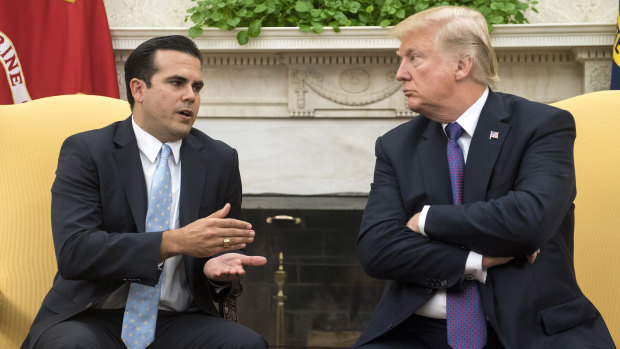 Ricardo Rossello, governor of Puerto Rico, with US President Donald Trump at the White House following Hurricane Maria. Trump said his administration's response to Hurricane Maria in Puerto Rico deserved a "perfect 10".