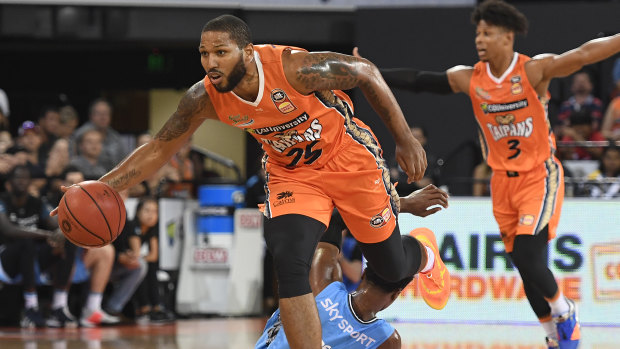 Nominee DJ Newill makes a break in the Taipans' round 15 win over the Breakers.