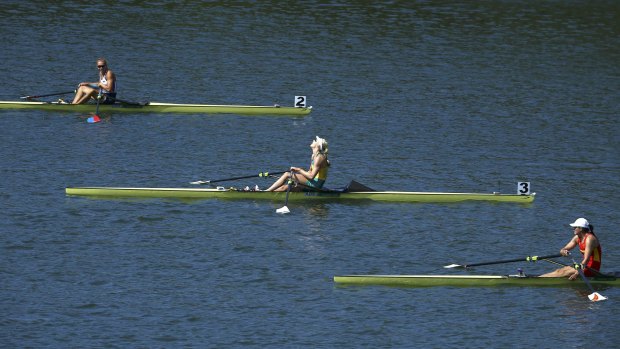 Pet event: Kim Brennan finishes ahead of Genevra Stone of the United States, top, and Duan Jingli of China, bottom, in the women's single sculls final.