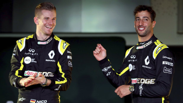 Daniel Ricciardo (right) in his new Renault colours, which he'll competitively race in for the first time in Melbourne.