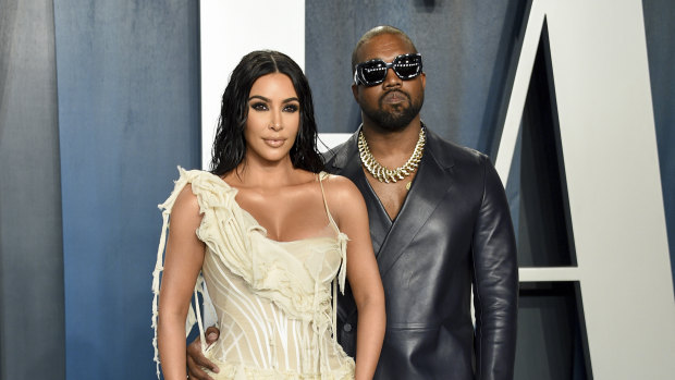Kim Kardashian West and Kanye West arrive at the Vanity Fair Oscar Party in Beverly Hills last year.