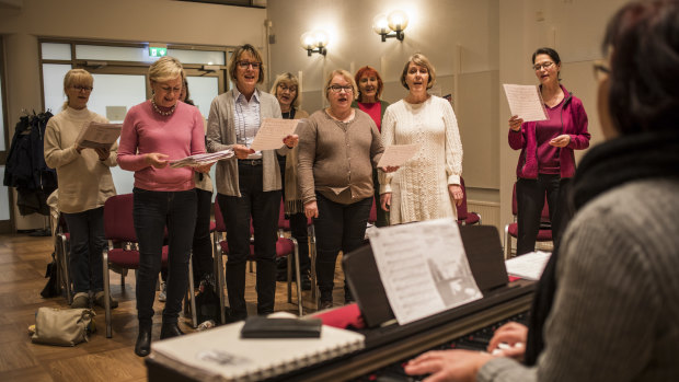 A choir rehearsing at the Adult Education Center in Kauniainen, Finland.