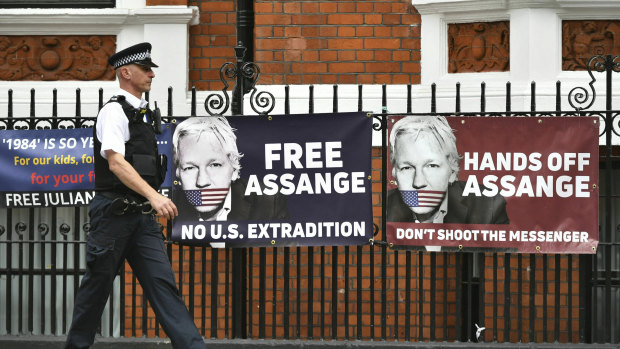 A police officer walks past the Ecuadorian embassy in London on Monday.